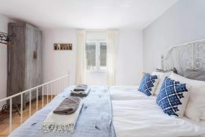 Postel nebo postele na pokoji v ubytování Villa Pino + 32 fotografií