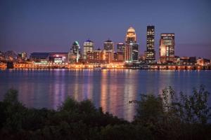 a view of a city skyline at night at Louisville Marriott East in Louisville +17 photos