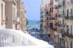 a view of a street in a city with buildings at Palazzo Zippitelli Apartments in Bari