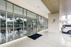 Fotografie z fotogalerie ubytování RedLiving Apartemen Springlake Summarecon - Happy Rooms with Netflix v destinaci Rawabugel