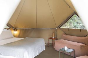 Wecamp San Sebastián客房内的一张或多张床位