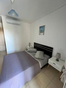 Ένα ή περισσότερα κρεβάτια σε δωμάτιο στο Luxury Studio Artemida