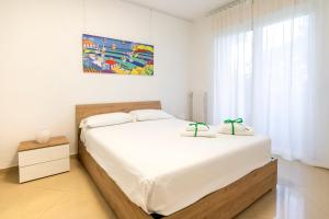 Letto o letti in una camera di Boscoincittà Apt with garage and whirlpool tub