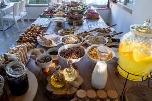 a long table filled with different types of food at Costa Bodrum City in Bodrum City