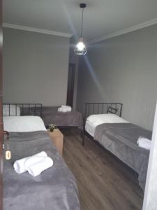 A bed or beds in a room at ELSADA