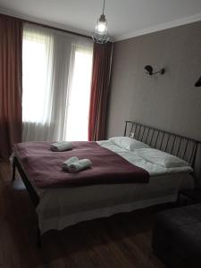 A bed or beds in a room at ELSADA