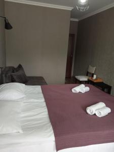 A bed or beds in a room at ELSADA
