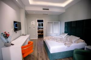 Postel nebo postele na pokoji v ubytování Hotel Olsi