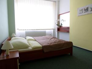 Letto o letti in una camera di Hotel Steiger