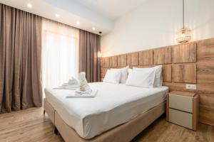 Letto o letti in una camera di Hotel Olea