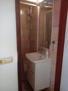 Koupelna v ubytování Apartmani Marijanovic + 54 fotografií