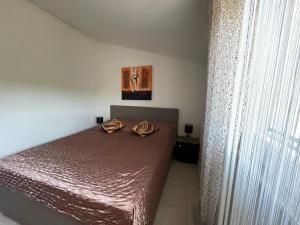 Posteľ alebo postele v izbe v ubytovaní Holiday House Rusticana Sali, Dugi otok near NP Kornati