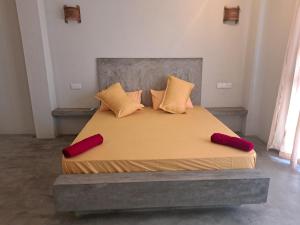 מיטה או מיטות בחדר ב-The Surf Access Guest House