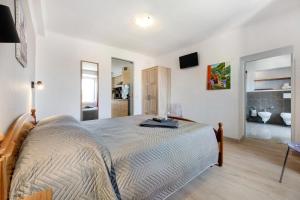 Ліжко або ліжка в номері Taronico Apartments Duck