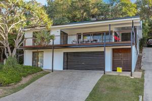 an image of a house with a garage at 19a George Nothling Drive in Point Lookout