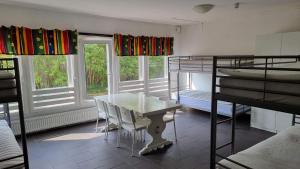 Postel nebo postele na pokoji v ubytování Gullspångs Vandrarhem
