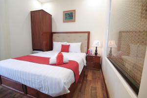 Giường trong phòng chung tại Kadupul Hotel Nguyen Thai Son