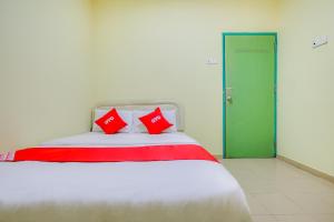 Postel nebo postele na pokoji v ubytování Foong Inn Hotel Banting