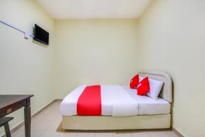 Postel nebo postele na pokoji v ubytování Foong Inn Hotel Banting