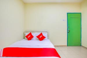 Postel nebo postele na pokoji v ubytování Foong Inn Hotel Banting