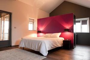 Кровать или кровати в номере La Villa Montillet