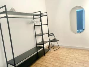 Ein Etagenbett oder Etagenbetten in einem Zimmer der Unterkunft Appartement avec vue sur le port