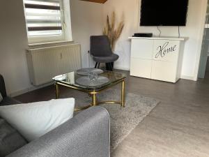 TV a/nebo společenská místnost v ubytování Apartment Auszeit