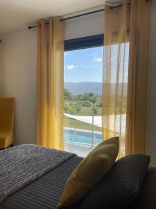 Nespecifikovaný výhled na hory nebo výhled na hory při pohledu z bed and breakfast + 3 fotografie