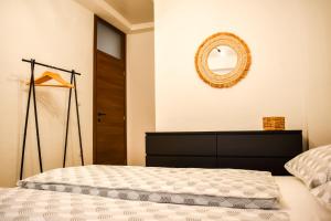 Un pat sau paturi într-o cameră la Apartman Nada