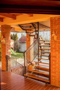A balcony or terrace at Nosztalgia Vendégház