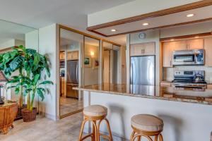 Kuchyň nebo kuchyňský kout v ubytování Papakea F105 + 21 fotografií