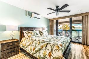 Ένα ή περισσότερα κρεβάτια σε δωμάτιο στο Noelani 309 +44 φωτογραφίες