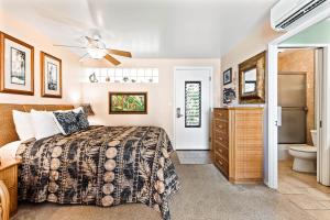 En eller flere senge i et værelse på Noelani 212 + 17 billeder