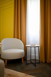 Posezení v ubytování Three Pearls Deluxe Rooms & Studios