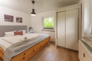 Postel nebo postele na pokoji v ubytování Kesselgrubs Apartements Ski & Badeglück