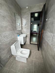 Koupelna v ubytování Aparthotel Alfa