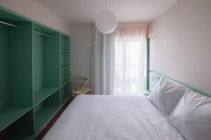 Terra Aurea Aparthotel客房内的一张或多张床位