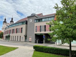 a building on the side of a street at Holiday Inn Trnava by IHG in Trnava
