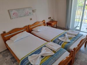 Postel nebo postele na pokoji v ubytování Golden Beach Sea View
