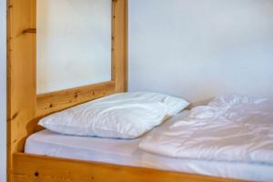 Postel nebo postele na pokoji v ubytování Lindenhof Apt 3