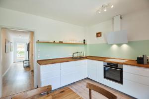Η κουζίνα ή μικρή κουζίνα στο Ferienwohnung zum Steingarten +13 φωτογραφίες