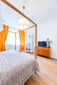 Säng eller sängar i ett rum på Silvie Apartments - Masaryk dolní