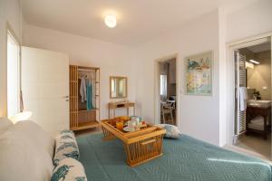 Voodi või voodid majutusasutuse Aurelia Sea View Loft Suite toas +5 fotot