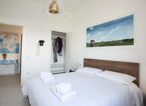 Postel nebo postele na pokoji v ubytování Isola dei Racconti - Guesthouse - Apartment