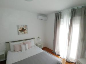Posteľ alebo postele v izbe v ubytovaní LUXURY APARTMENT MEJE