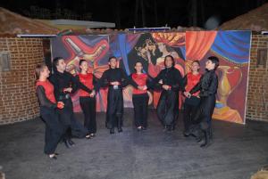 a group of people standing in front of a painting at Marmaris Park Hotel in Marmaris