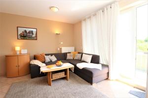 Posezení v ubytování Altes Wasserwerk App 22