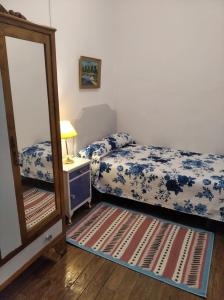 Tempat tidur dalam kamar di Casa Daniel en Castro Caldelas