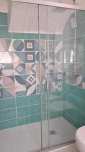 a bathroom with a shower and a toilet at La Dolce Vita in Camerota