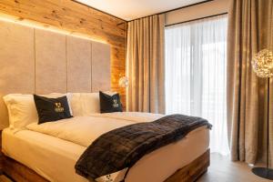 Un pat sau paturi într-o cameră la Araldo Eco-Lodge